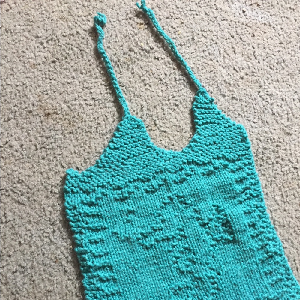 Hand knitted seahorse baby bib